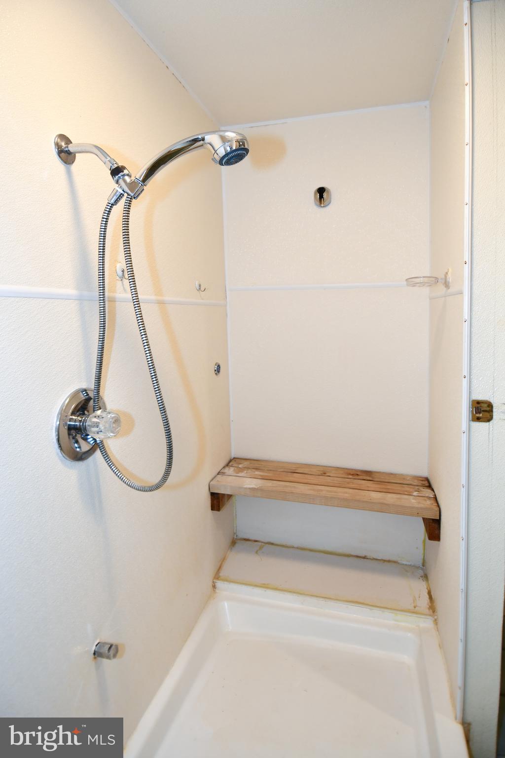 39 Windwhisper Lane Annapolis, MD 21403 - Photo 51 of 64 a bathroom with a bath tub and a shower