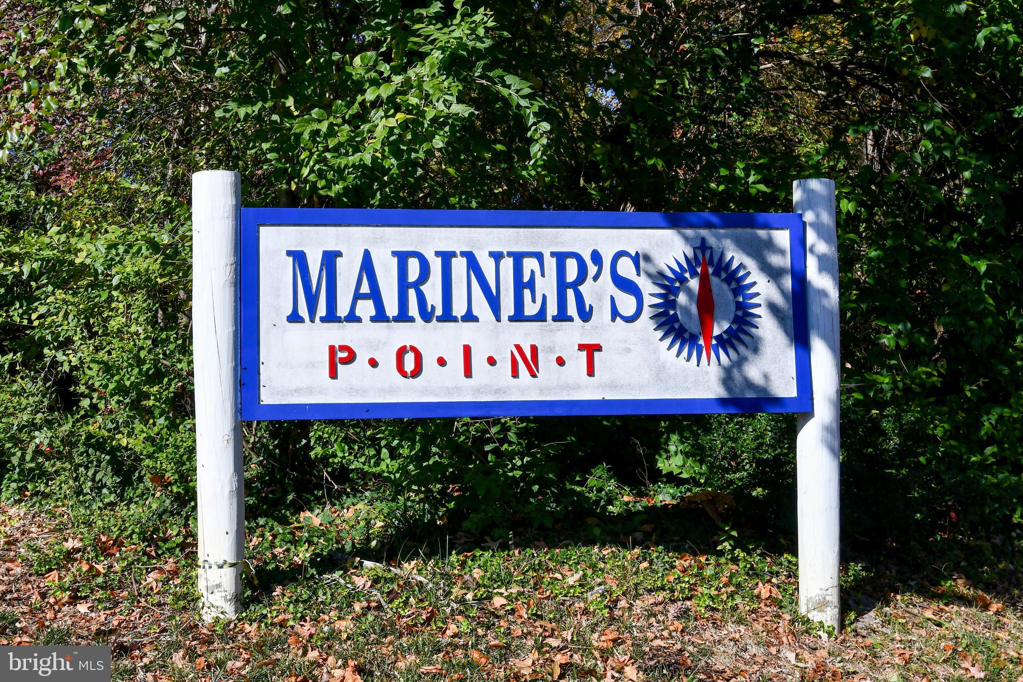 39 Windwhisper Lane Annapolis, MD 21403 - Photo 63 of 64 a sign on the side of the road