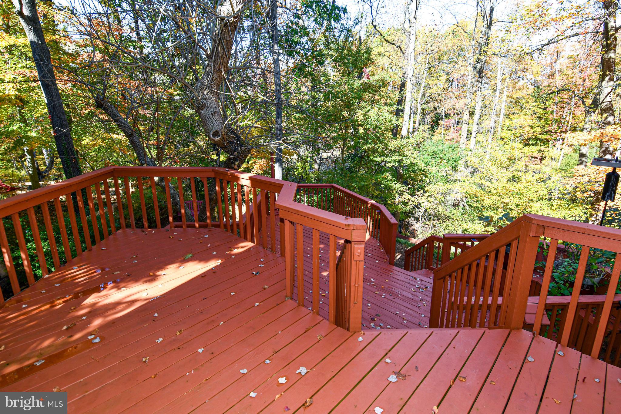 39 Windwhisper Lane Annapolis, MD 21403 - Photo 8 of 64 a view of deck with wooden floor and outdoor seating