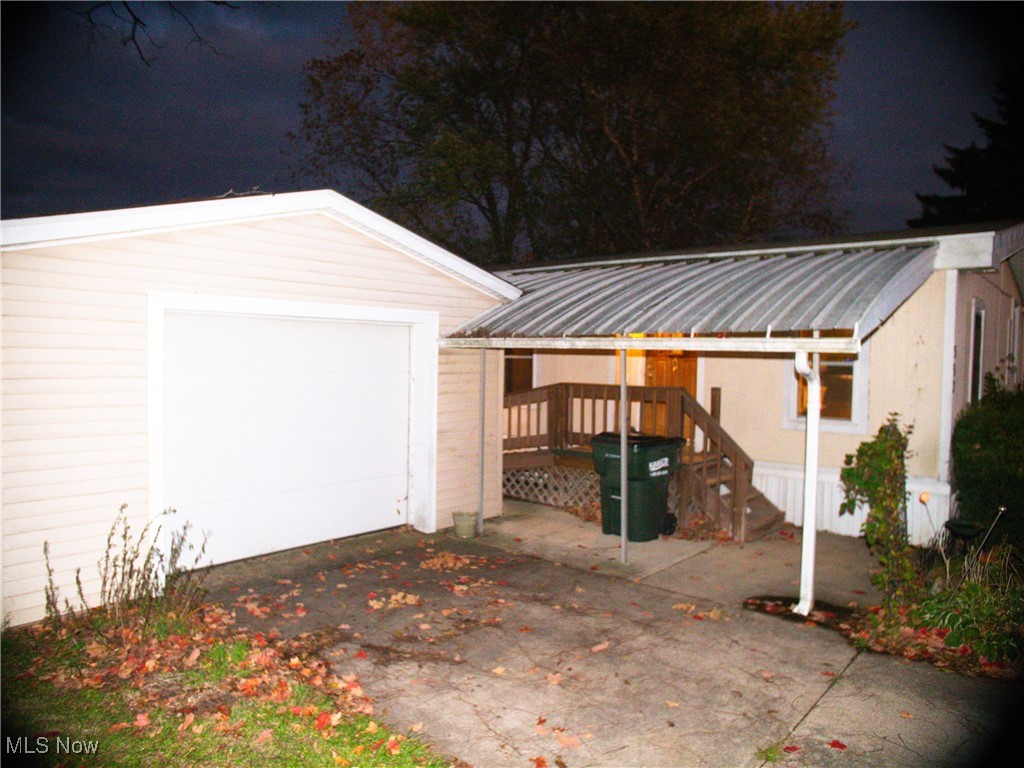 332 Max Road Lodi, OH 44254 - Photo 1 of 22 View of front door, paved drive way, and garage