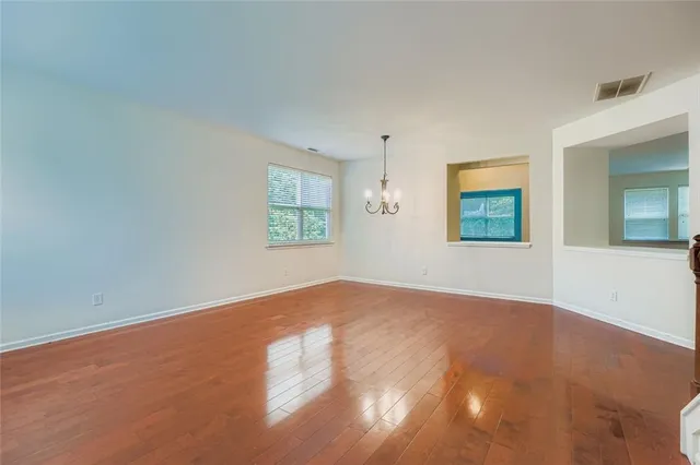 an empty room with windows