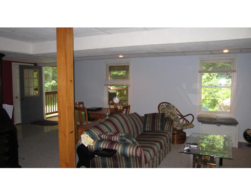 61 Clark Road Sturbridge, MA 01518 - Photo 13 of 17 a black and white photo of a living room