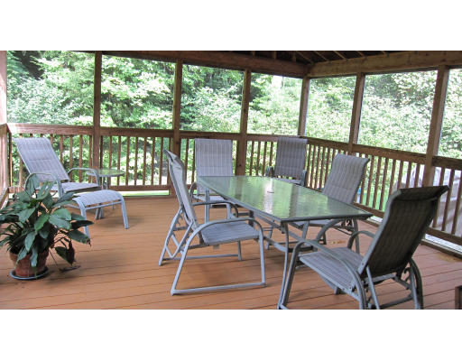 61 Clark Road Sturbridge, MA 01518 - Photo 14 of 17 a dining room with furniture and floor to ceiling windows