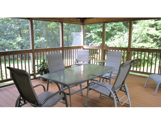 61 Clark Road Sturbridge, MA 01518 - Photo 15 of 17 a outdoor sitting area with furniture and wooden floor