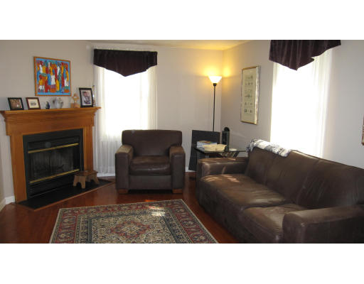 61 Clark Road Sturbridge, MA 01518 - Photo 2 of 17 a living room with furniture and a fireplace