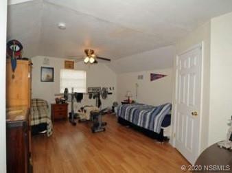 415 Stacy Grove Road Oak Hill, FL 32759 - Photo 22 of 25 a living room with furniture