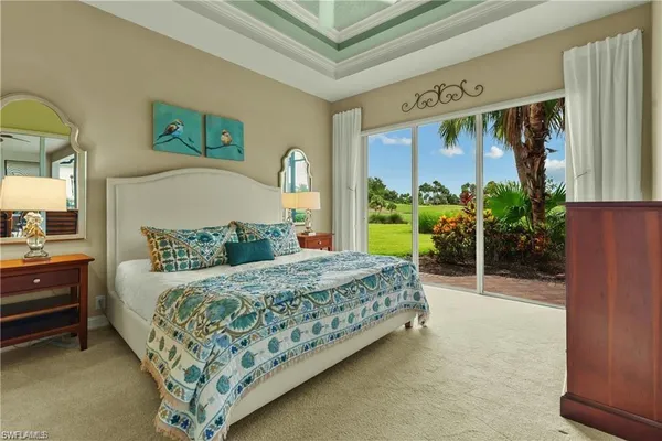 a spacious bathroom with a granite countertop sink mirror and a