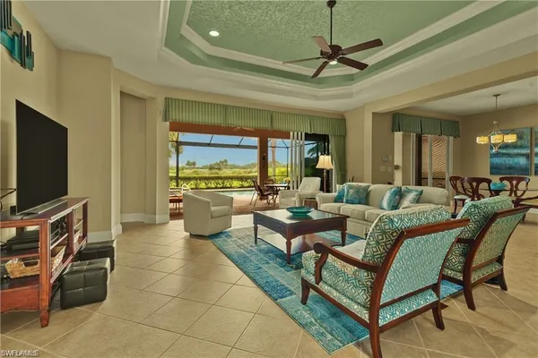 a large kitchen with stainless steel appliances granite countertop a stove a sink dishwasher and a refrigerator