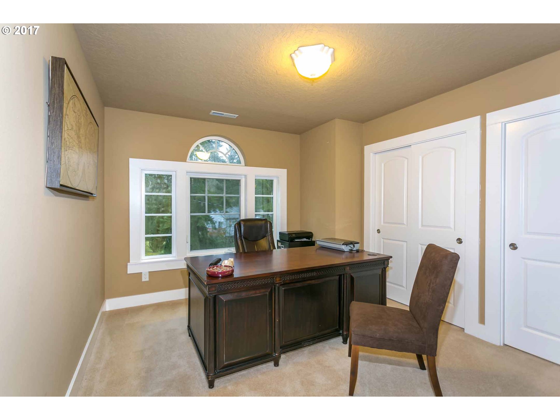 14525 Southeast Duke Street Portland, OR 97236 - Photo 21 of 27 a view of a workspace with furniture and a window
