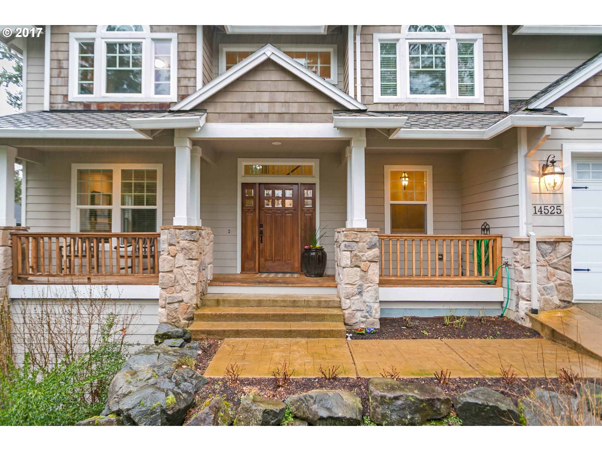 14525 Southeast Duke Street Portland, OR 97236 - Photo 3 of 27 front view of a house with a swimming pool