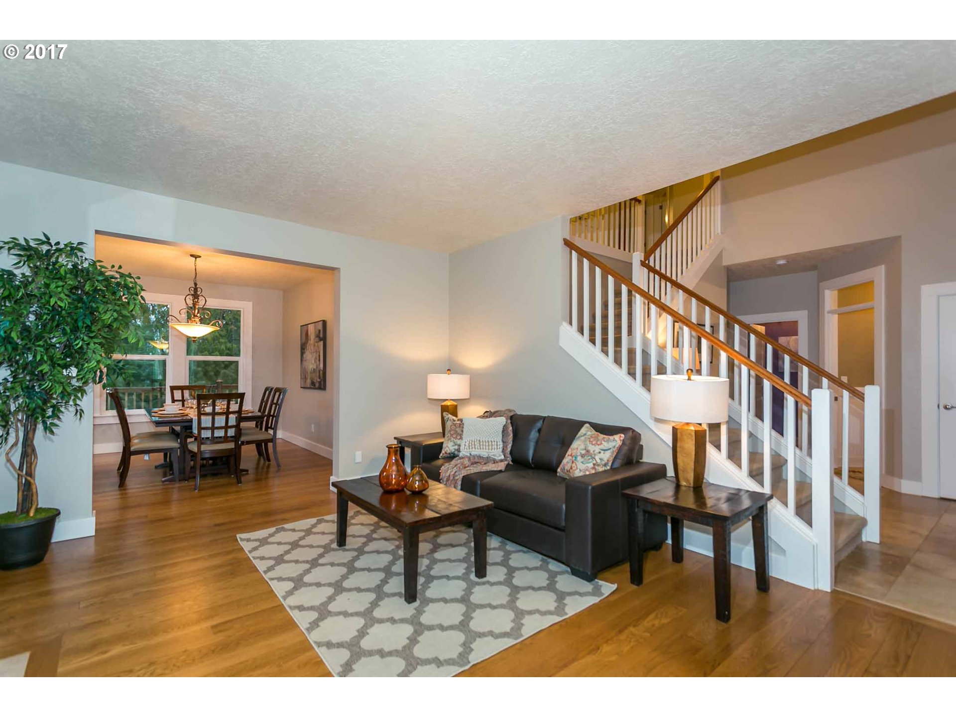 14525 Southeast Duke Street Portland, OR 97236 - Photo 7 of 27 a living room with furniture and a table
