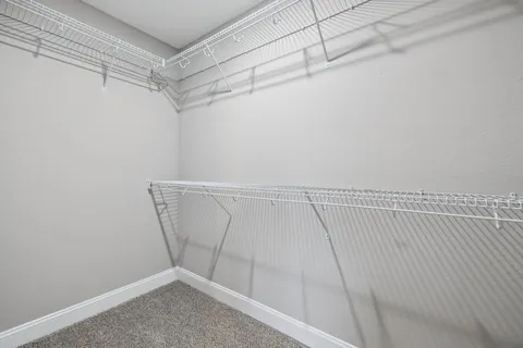 a view of a room with racks on the wall