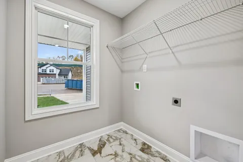 a view of a front door and bedroom