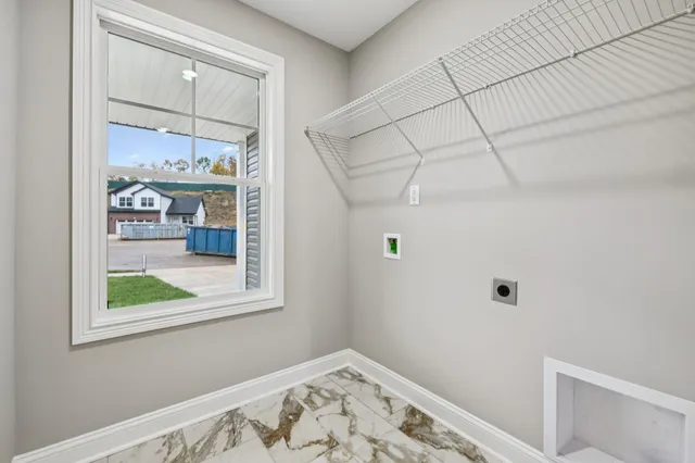 a view of a front door and bedroom