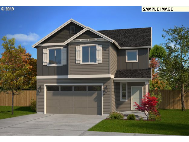 1412 Northeast 172nd Street Ridgefield, WA 98642 - Photo 1 of 1 a front view of a house with a yard and garage
