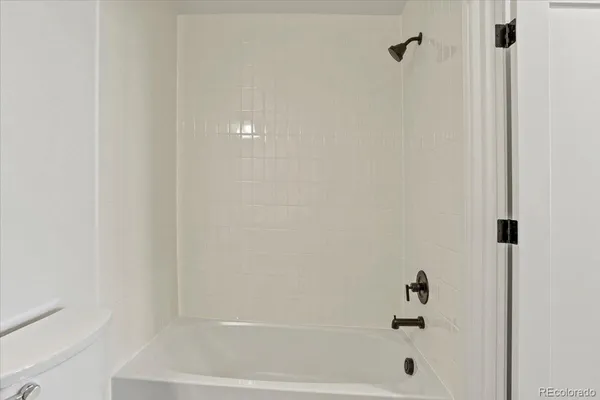 a close up of a bathtub curtain