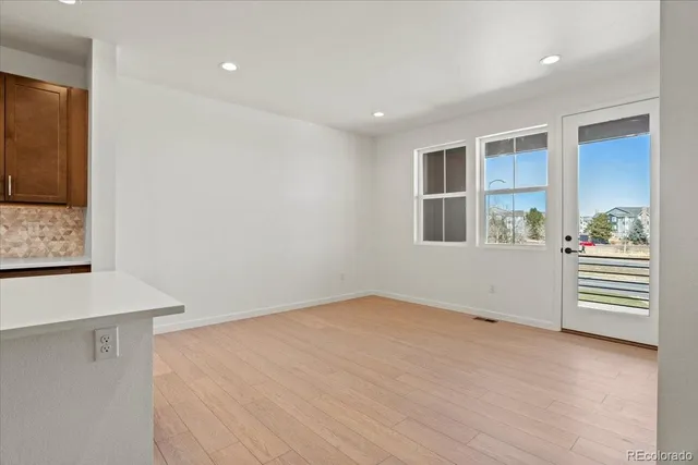 an empty room with windows