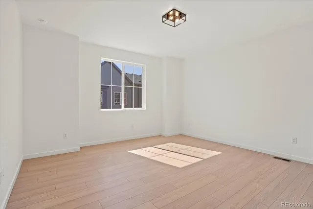 an empty room with a workspace