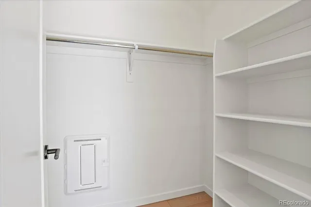 a view of an empty walk in closet