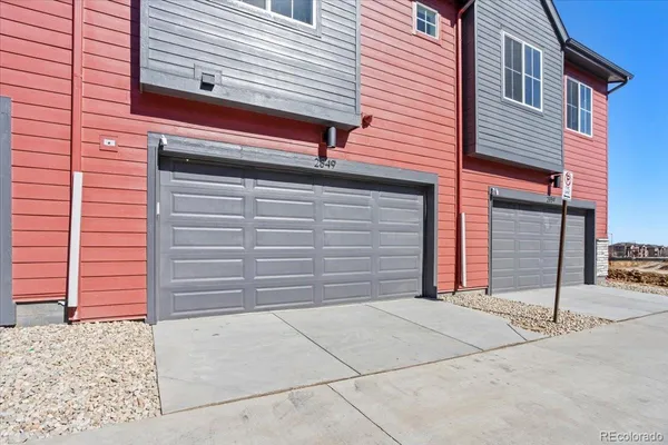 a view of a house with a garage