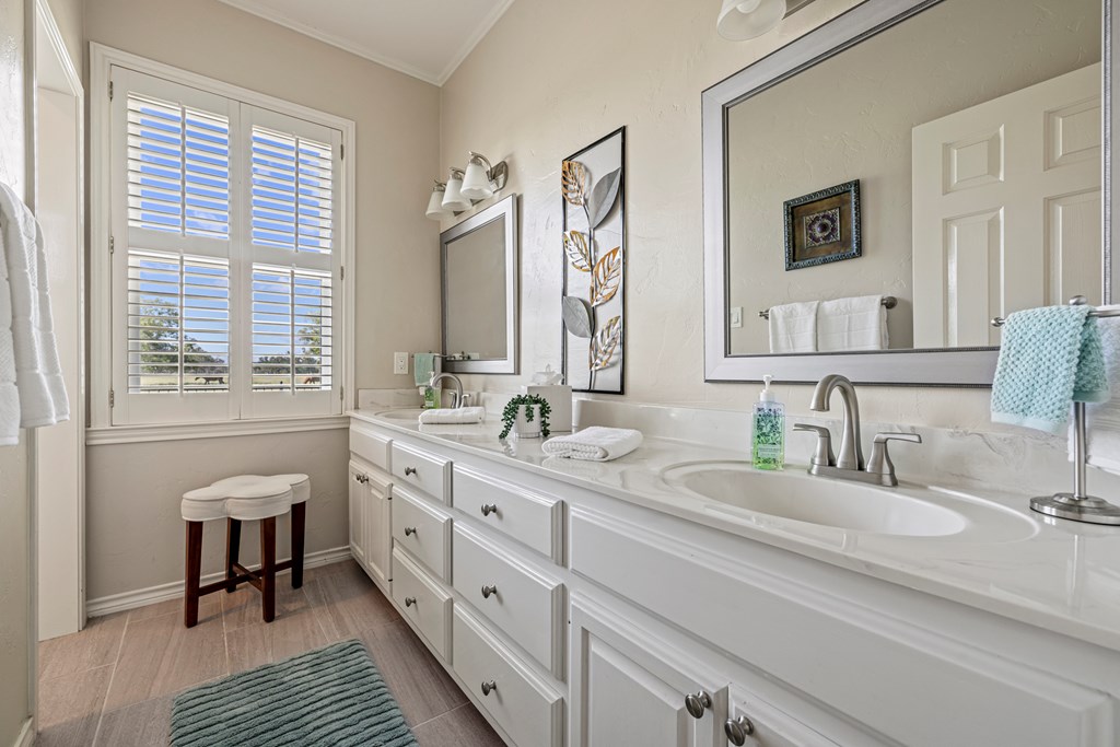 234 Nelson-rouse Road Fredericksburg, TX 78624 - Photo 22 of 41 a bathroom with double vanity and a two mirror