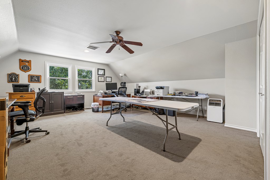 234 Nelson-rouse Road Fredericksburg, TX 78624 - Photo 23 of 41 a view of a livingroom with workspace and a window