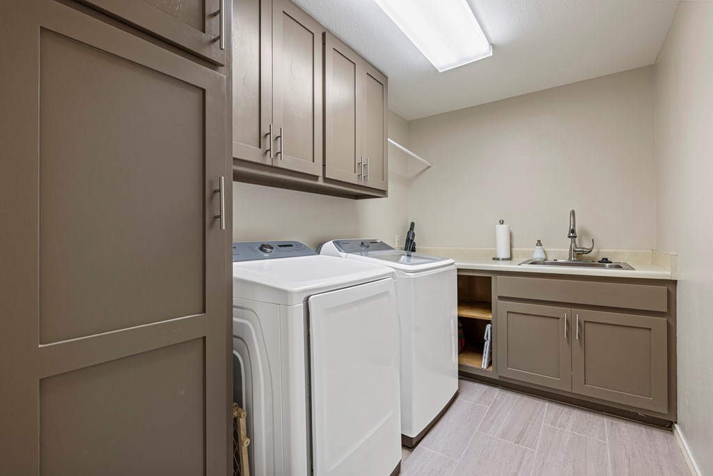 234 Nelson-rouse Road Fredericksburg, TX 78624 - Photo 24 of 41 a utility room with cabinets washer and dryer
