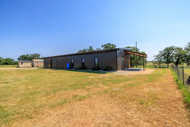 a house view with a swimming pool