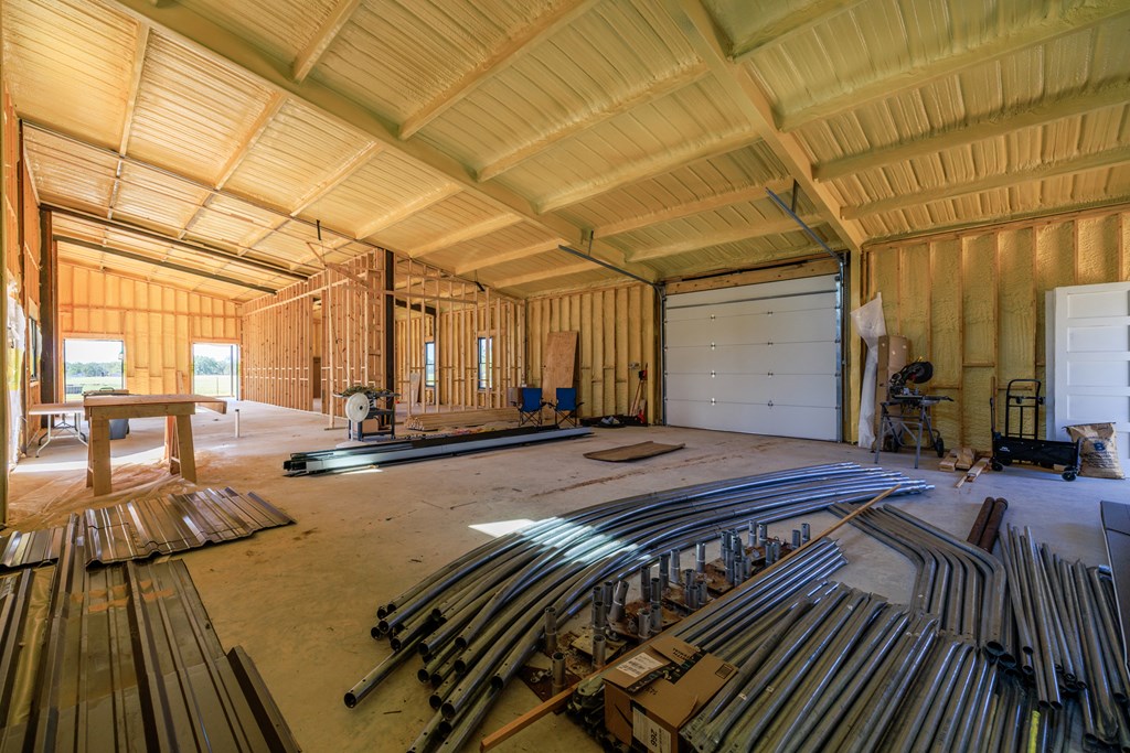 234 Nelson-rouse Road Fredericksburg, TX 78624 - Photo 33 of 41 a spacious bathroom with a vanity and wooden floor