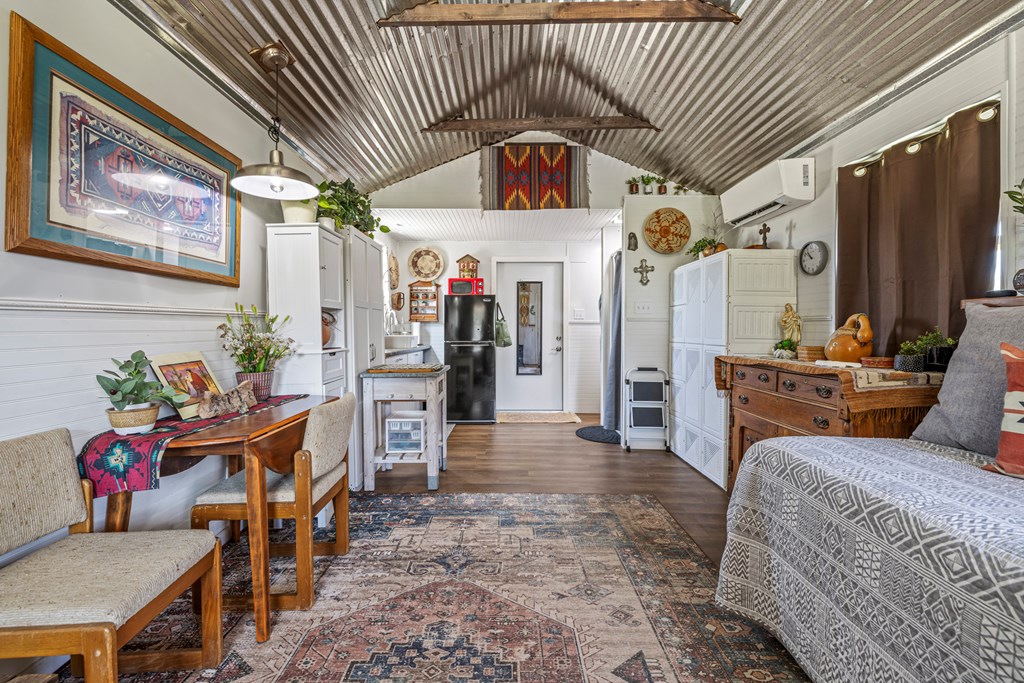 234 Nelson-rouse Road Fredericksburg, TX 78624 - Photo 36 of 41 a living room with furniture and a flat screen tv