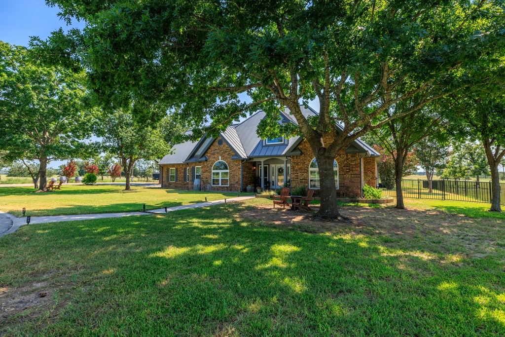 234 Nelson-rouse Road Fredericksburg, TX 78624 - Photo 4 of 41 a view of a house with a yard