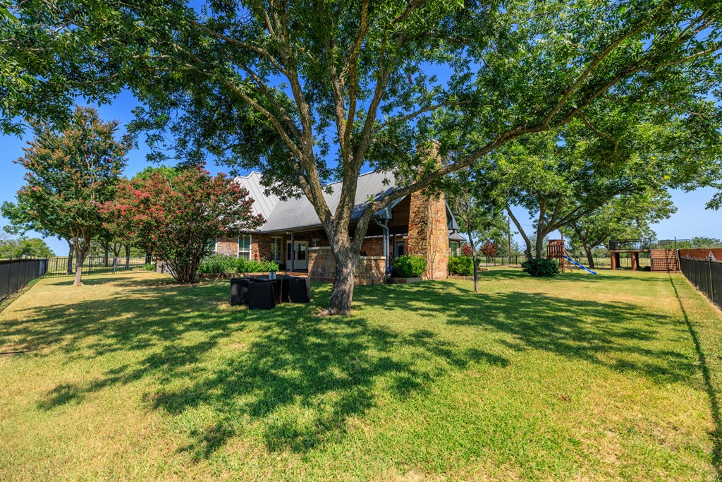 234 Nelson-rouse Road Fredericksburg, TX 78624 - Photo 6 of 41 a view of a house with a tree in the yard