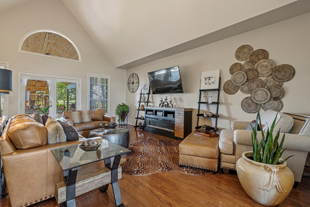 234 Nelson-rouse Road Fredericksburg, TX 78624 - Photo 10 of 41 a living room with furniture and a flat screen tv