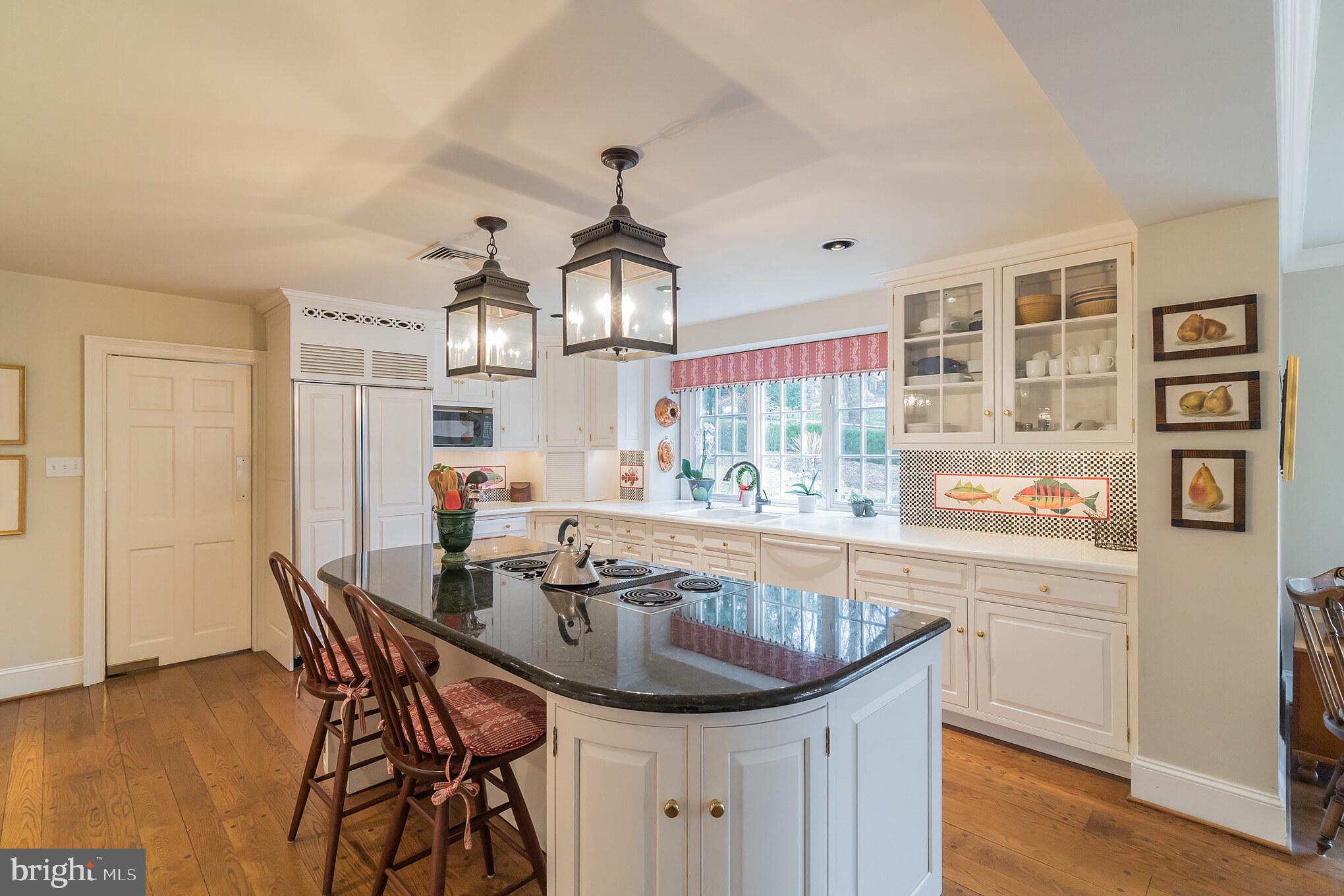 1 Sugarbrook Road Malvern, PA 19355 - Photo 14 of 56 Spacious kitchen with center island.