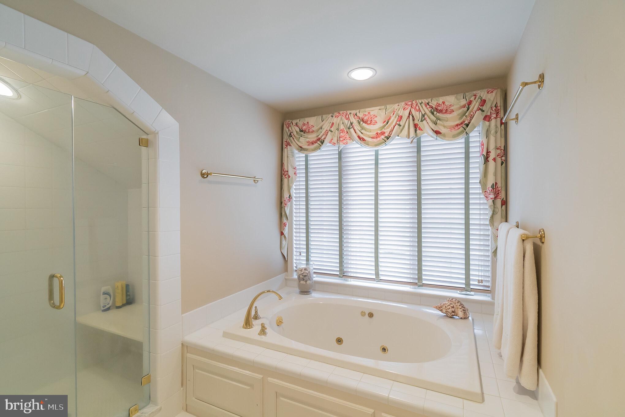 1 Sugarbrook Road Malvern, PA 19355 - Photo 31 of 56 Master soaking tub and step in shower.