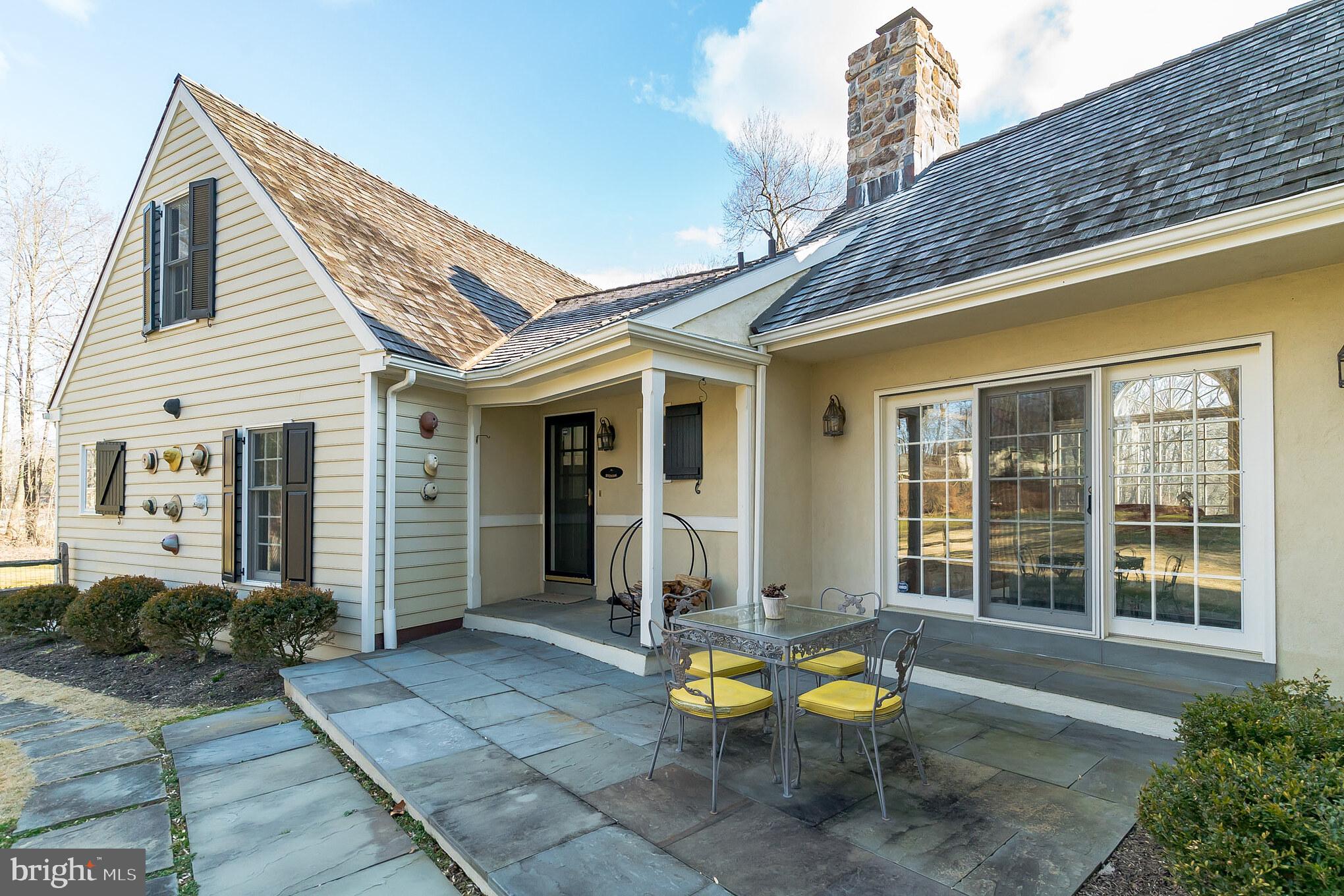 1 Sugarbrook Road Malvern, PA 19355 - Photo 39 of 56 Blue stone patio just off breakfast room.