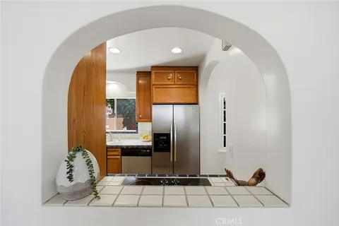 a view of a entryway door with livingroom