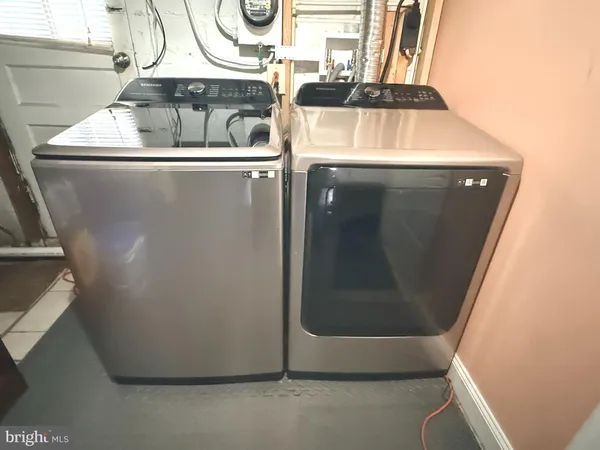 a view of a refrigerator in a kitchen