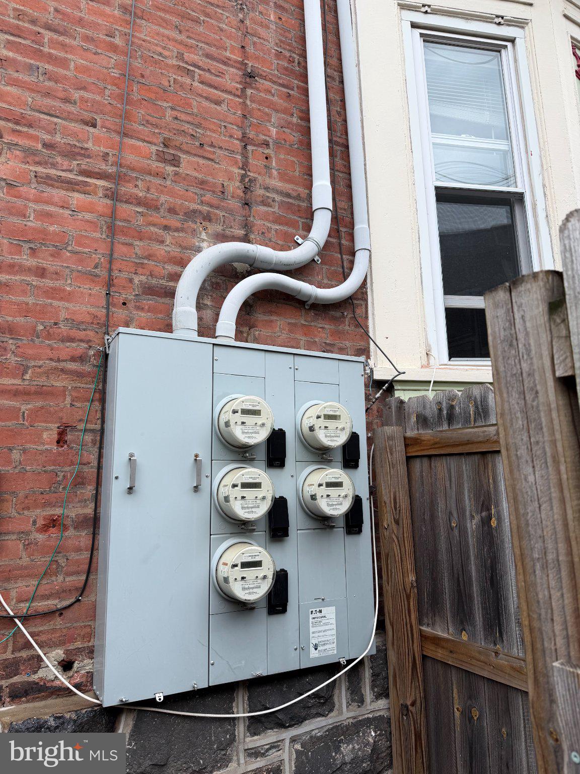 815 South 49th Street Philadelphia, PA 19143 - Photo 61 of 72 Utility meters on a brick facade.