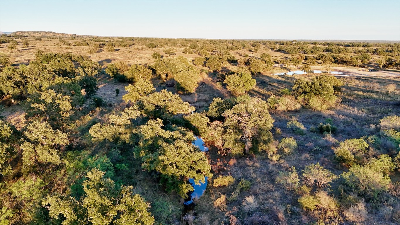 6540 County Road 409 Llano, TX 78643 - Photo 3 of 19 an aerial view of residential houses with outdoor space