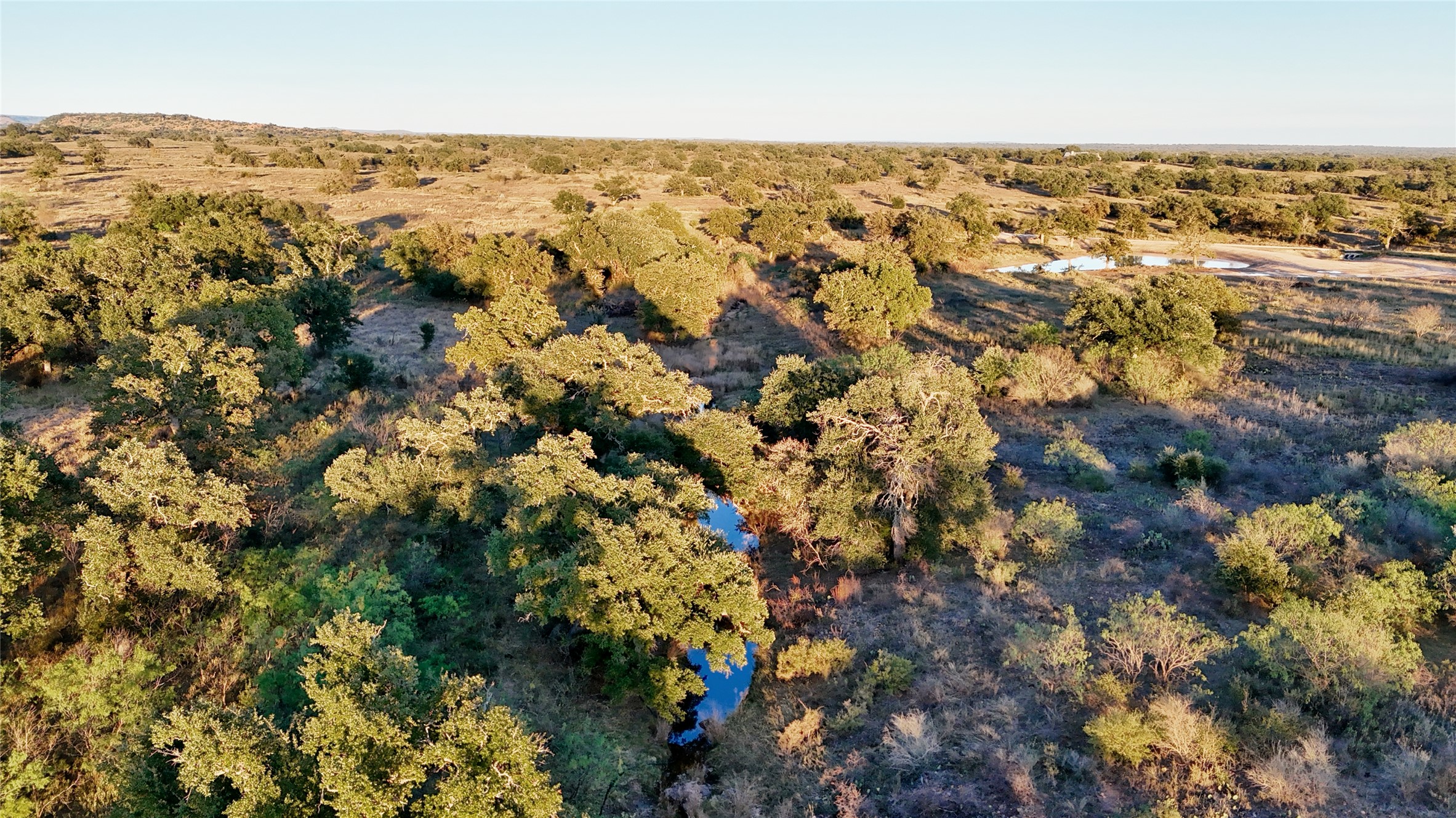 6540 County Road 409 Llano, TX 78643 - Photo 3 of 19 an aerial view of residential houses with outdoor space