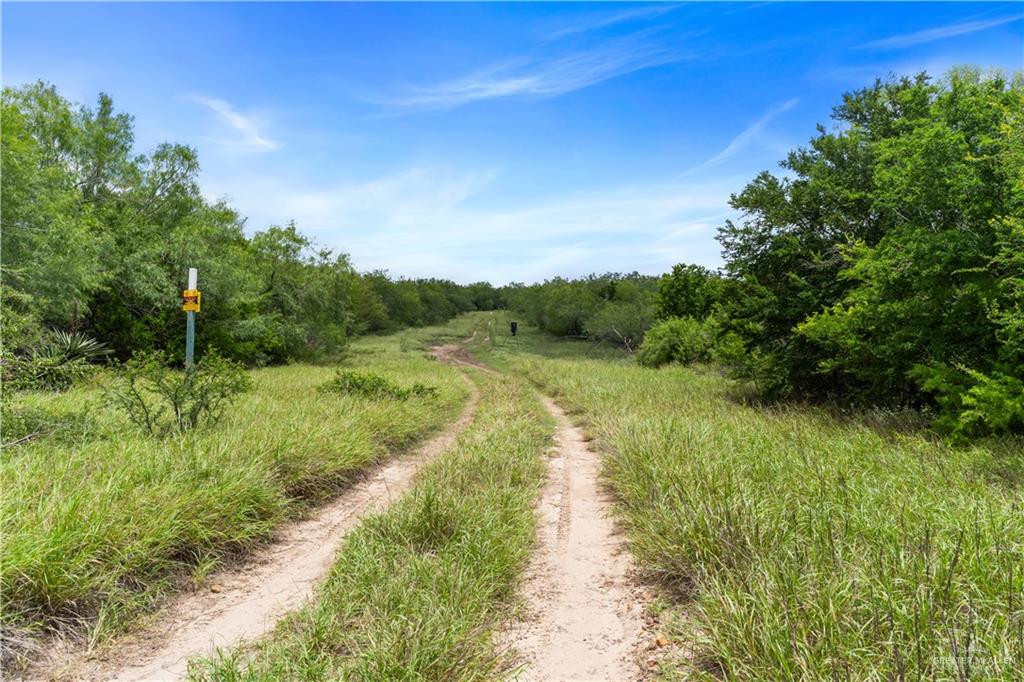 0 Military Road Penitas, TX 78576 - Photo 19 of 26 a view of a lake with a yard