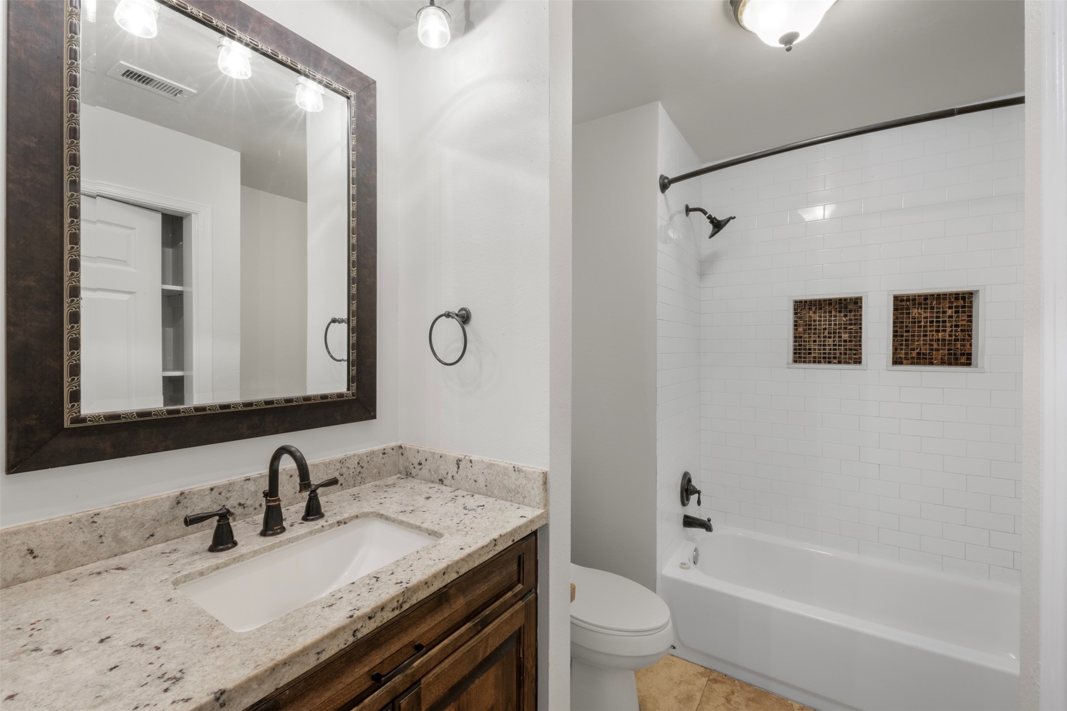 28081 Ivy Oaks Lane Splendora, TX 77372 - Photo 13 of 27 a bathroom with a granite countertop sink toilet and shower