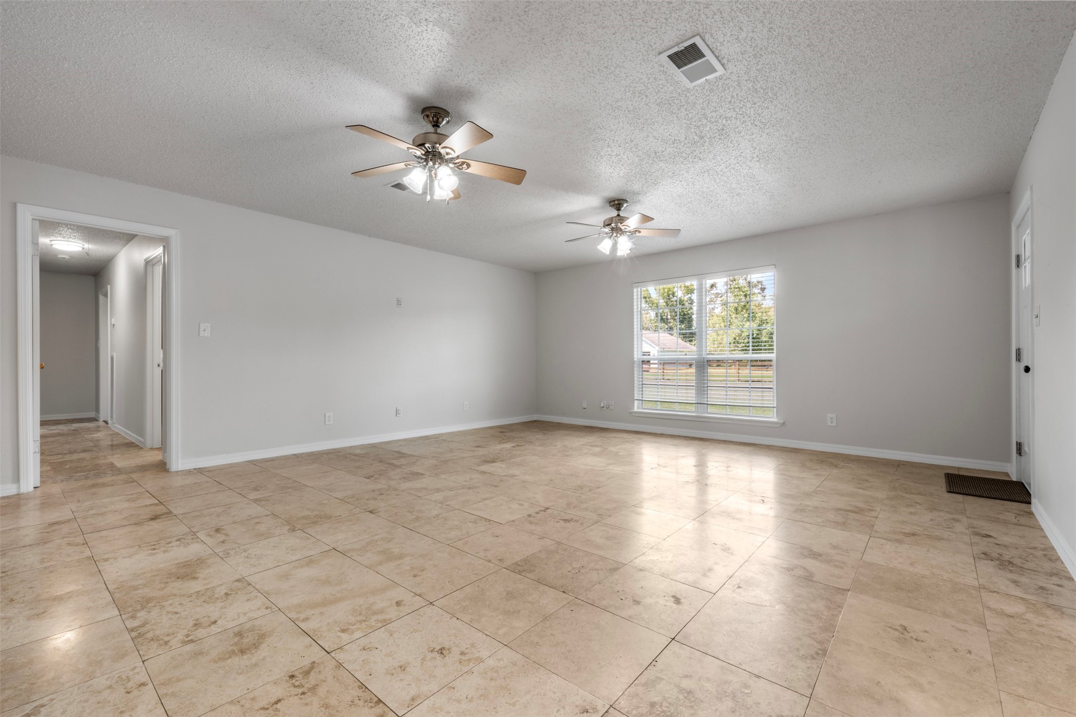 28081 Ivy Oaks Lane Splendora, TX 77372 - Photo 15 of 27 a view of an empty room with a window