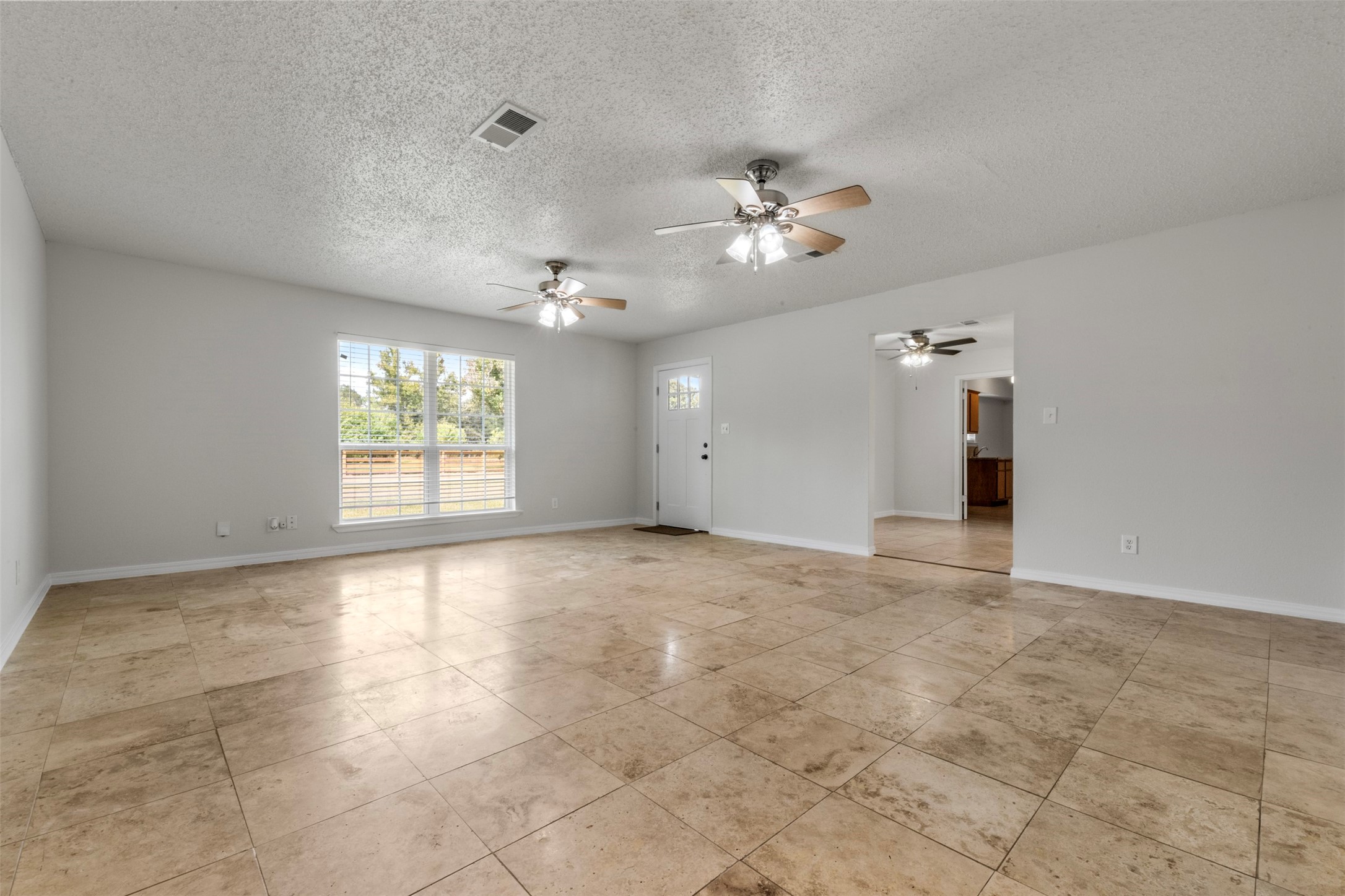 28081 Ivy Oaks Lane Splendora, TX 77372 - Photo 16 of 27 a view of an empty room with a window