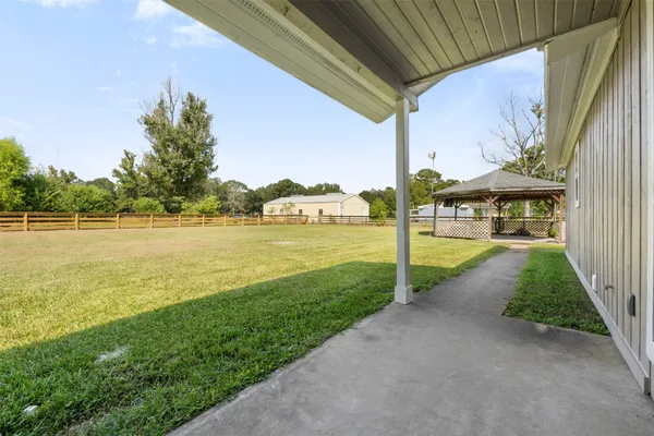 a view of a street with an outdoor space