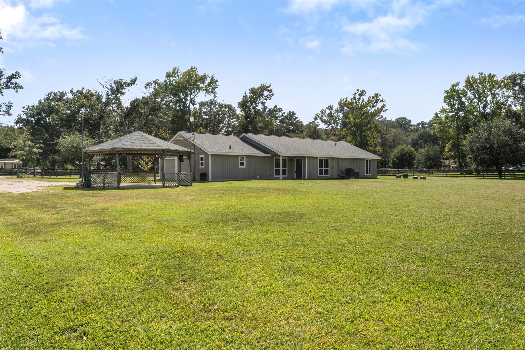 28081 Ivy Oaks Lane Splendora, TX 77372 - Photo 24 of 27 a house with swimming pool in front of it