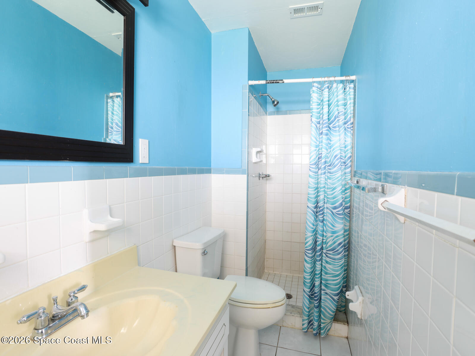 2375 Ricky Road Melbourne, FL 32935 - Photo 23 of 41 a bathroom with a sink toilet and shower