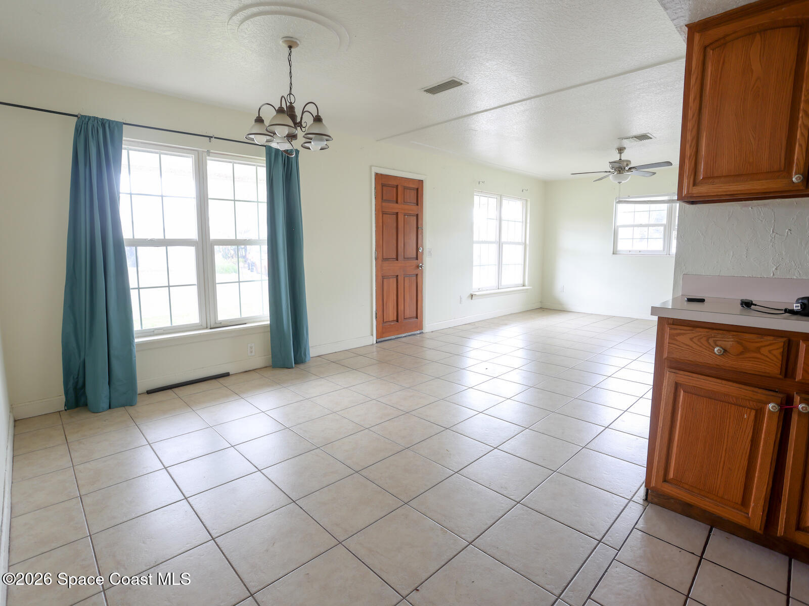 2375 Ricky Road Melbourne, FL 32935 - Photo 29 of 41 a view of a kitchen with a sink and a window