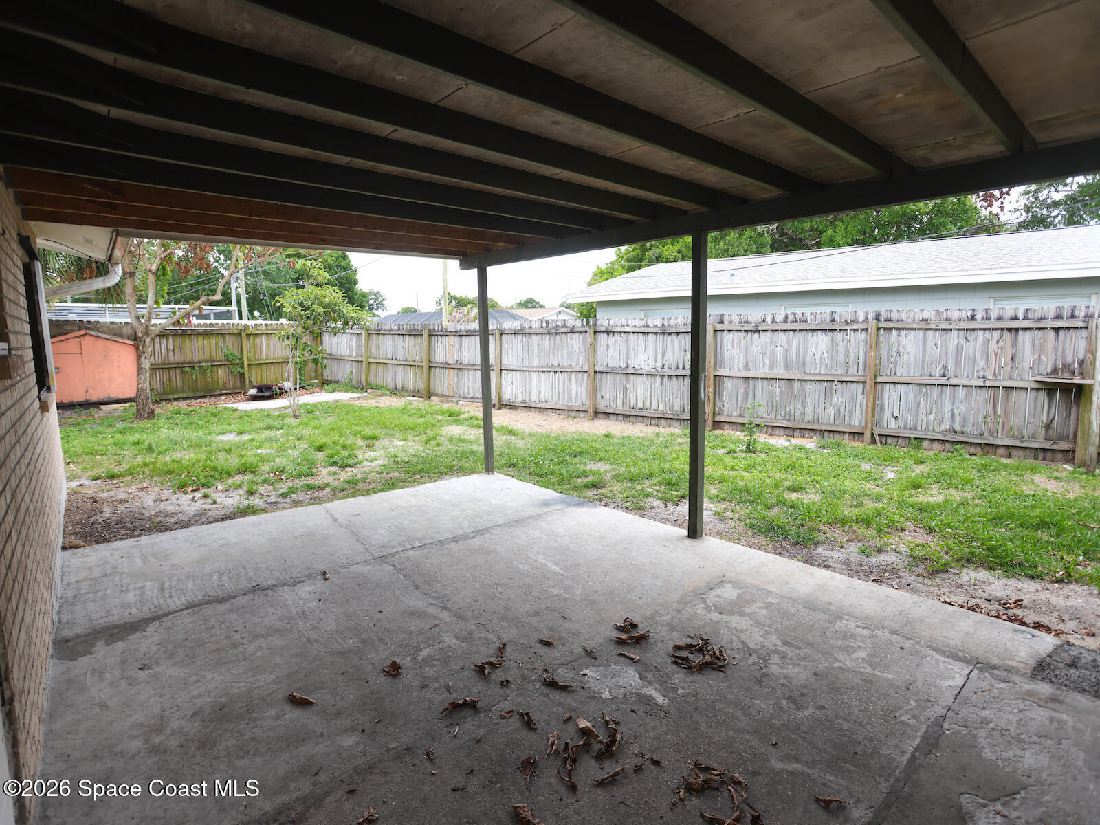 2375 Ricky Road Melbourne, FL 32935 - Photo 39 of 41 a view of a yard with porch